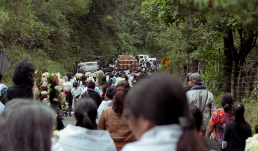 Photo by Alejandro Flores. This shows the scene of a funeral procession.